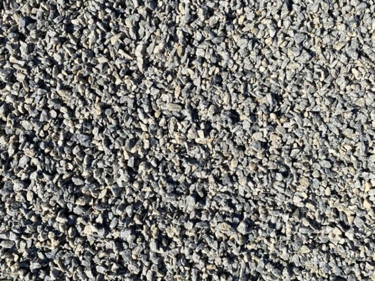A close up image of a gravel road.